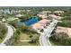 Aerial view of upscale community featuring lake access and beautifully maintained homes at 4209 Cascade Falls Dr, Sarasota, FL 34243