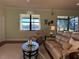 Living room with lake view at 5616 107Th E Ter, Parrish, FL 34219