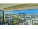Cozy balcony seating offers serene views of the neighborhood and a relaxing outdoor space at 601 Gulf N Dr # 209, Bradenton Beach, FL 34217