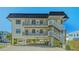 Coastal home on stilts, offering covered parking and easy access to upper-level living spaces at 601 Gulf N Dr # 209, Bradenton Beach, FL 34217