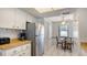 Kitchen with stainless steel fridge and wood countertop at 601 Gulf N Dr # 209, Bradenton Beach, FL 34217