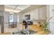 Kitchen with wood countertop, stainless steel sink, and appliances at 601 Gulf N Dr # 209, Bradenton Beach, FL 34217