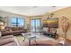 Relaxing living room with a large TV and ocean views for ultimate entertainment at 601 Gulf N Dr # 209, Bradenton Beach, FL 34217