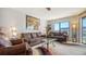Comfortable living room features plush sofas, stylish decor, and plenty of natural light at 601 Gulf N Dr # 209, Bradenton Beach, FL 34217