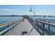 Scenic pier walkway over calm water at 601 Gulf N Dr # 209, Bradenton Beach, FL 34217