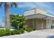 BeachHouse Waterfront Restaurant, modern building with outdoor seating at 601 Gulf N Dr # 209, Bradenton Beach, FL 34217