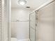 Bathroom with a shower and tiled walls at 7145 Bright Creek Dr # 33, Sarasota, FL 34231