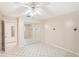 Bedroom with mirrored closet doors and tiled floors at 7145 Bright Creek Dr # 33, Sarasota, FL 34231