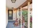 Covered entryway with access to the front door and side yard at 7145 Bright Creek Dr # 33, Sarasota, FL 34231