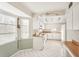 Galley kitchen with white cabinets and wood countertops at 7145 Bright Creek Dr # 33, Sarasota, FL 34231