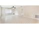 Spacious living room with tile flooring and a ceiling fan at 7145 Bright Creek Dr # 33, Sarasota, FL 34231