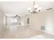 Living room featuring tiled floors and a chandelier at 7145 Bright Creek Dr # 33, Sarasota, FL 34231