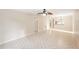 Open concept living and dining area with tile floors at 7145 Bright Creek Dr # 33, Sarasota, FL 34231