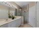 Double vanity, walk-in shower, and lots of storage at 918 River Basin Ct # 101A, Bradenton, FL 34212