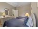 Two twin beds, dresser, and access to bathroom at 918 River Basin Ct # 101A, Bradenton, FL 34212