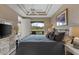 King bed, water view from sliding glass doors, dresser at 918 River Basin Ct # 101A, Bradenton, FL 34212