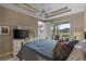 King bed, dresser, and view into another room at 918 River Basin Ct # 101A, Bradenton, FL 34212
