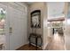 Bright and airy entryway with hardwood floors and a stylish console table at 918 River Basin Ct # 101A, Bradenton, FL 34212