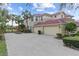 Two-story townhome with double garage and manicured landscaping at 918 River Basin Ct # 101A, Bradenton, FL 34212