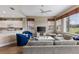 Spacious living room with comfortable seating and views to the golf course at 918 River Basin Ct # 101A, Bradenton, FL 34212