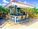 Relaxing pool bar with seating for residents at 918 River Basin Ct # 101A, Bradenton, FL 34212