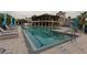 Community lap pool and recreational area at 918 River Basin Ct # 101A, Bradenton, FL 34212