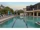 Relaxing community pool with plenty of seating at 918 River Basin Ct # 101A, Bradenton, FL 34212