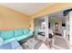 Balcony with seating, offering a peek into bedroom at 115 Tyler Dr # 203, Sarasota, FL 34236