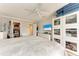 Bright bedroom with king bed and walk in closet at 115 Tyler Dr # 203, Sarasota, FL 34236