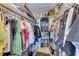 Large walk-in closet with ample shelving and hanging space at 115 Tyler Dr # 203, Sarasota, FL 34236