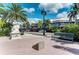 Picturesque street scene with statue, shops, and restaurants, showcasing local ambiance at 115 Tyler Dr # 203, Sarasota, FL 34236