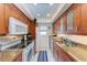 Bright kitchen with granite countertops and modern appliances at 115 Tyler Dr # 203, Sarasota, FL 34236