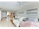 Open living area with white sectional sofa and view of dining area at 115 Tyler Dr # 203, Sarasota, FL 34236