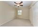 Spacious bedroom with ceiling fan and ample closet space at 1195 Villagio Cir # 201, Sarasota, FL 34237