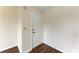 Interior entryway with white door and wood flooring at 1195 Villagio Cir # 201, Sarasota, FL 34237