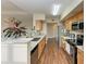 Modern kitchen with stainless steel appliances and granite countertops at 1195 Villagio Cir # 201, Sarasota, FL 34237