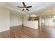 Open concept living and kitchen area with wood floors at 1195 Villagio Cir # 201, Sarasota, FL 34237