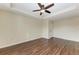 Living area with hardwood floors and ceiling fan at 1195 Villagio Cir # 201, Sarasota, FL 34237