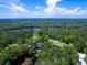 Waterfront property showcasing lush landscape and river views at 1245 Mill Creek Rd, Bradenton, FL 34212