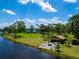 Aerial view showing house, dock, and gazebo on waterfront property at 1245 Mill Creek Rd, Bradenton, FL 34212