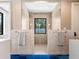 Spa-like Primary bathroom with double shower and marble accents at 1245 Mill Creek Rd, Bradenton, FL 34212