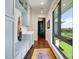 Bright hallway with built-in storage and river views at 1245 Mill Creek Rd, Bradenton, FL 34212