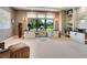 Bright home office features built-in shelving and large window at 1245 Mill Creek Rd, Bradenton, FL 34212