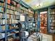 Spacious library with floor to ceiling bookshelves at 1245 Mill Creek Rd, Bradenton, FL 34212