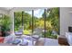 Bright living room with expansive windows overlooking the water at 1245 Mill Creek Rd, Bradenton, FL 34212