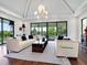 Spacious living room with high ceilings and stunning views at 1245 Mill Creek Rd, Bradenton, FL 34212