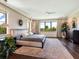 Spacious main bedroom with large windows and hardwood floors at 1245 Mill Creek Rd, Bradenton, FL 34212