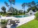 Relaxing pool area with comfortable lounge chairs and a tranquil atmosphere at 1245 Mill Creek Rd, Bradenton, FL 34212