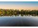 Scenic river view with lush vegetation at sunset at 1245 Mill Creek Rd, Bradenton, FL 34212