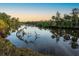 Tranquil river view with trees reflecting on water at 1245 Mill Creek Rd, Bradenton, FL 34212